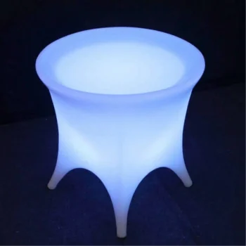 Mesa de resina con luz LED, diseñada para eventos, que aporta un toque contemporáneo y sofisticado.